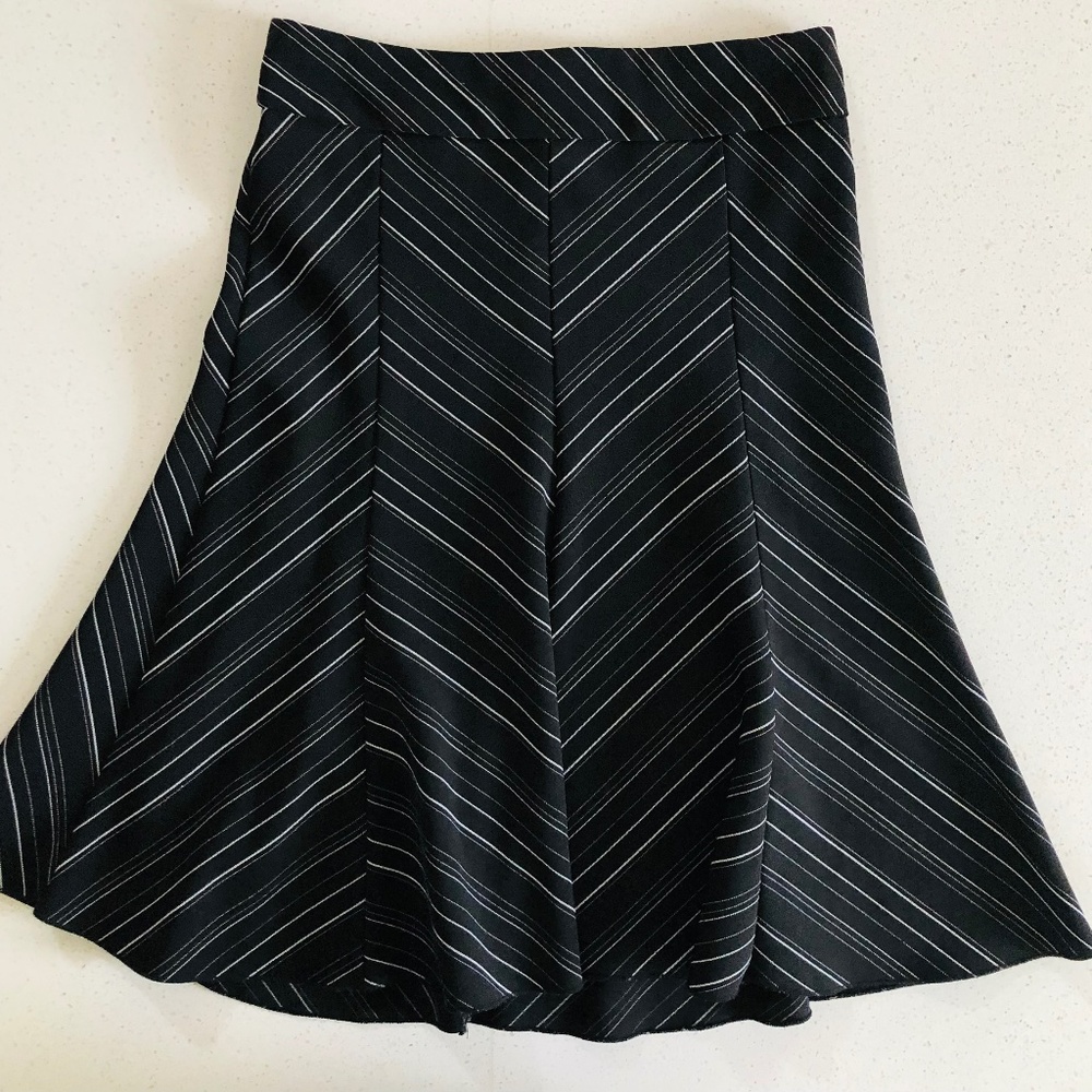 Flared skirt with black and white chevron pattern